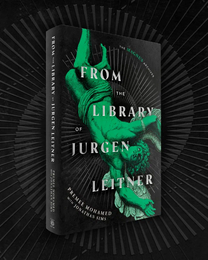A 3D mock-up of a book named "From the library of Jurgen Leitner" by Premee Mohamed with Jonathan Sims. The cover features a green coloured illustration of a man with wings strapped to his arms. He is upside down on the book cover, as if he is falling. 
